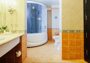 A bathroom at Sharm Domina Royal Suites