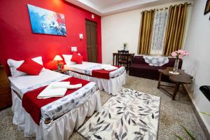 Ένα ή περισσότερα κρεβάτια σε δωμάτιο στο Celso's Home Stay