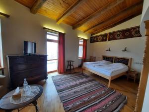 Postel nebo postele na pokoji v ubytování Hotel Mirhav