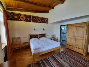Postel nebo postele na pokoji v ubytování Hotel Mirhav