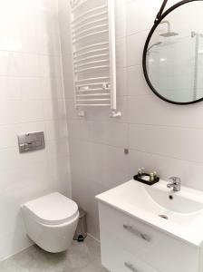 Koupelna v ubytování Apartamenty Plac Kolegiacki