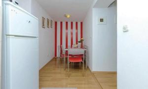 Kuchyň nebo kuchyňský kout v ubytování Apartments Raguz + 29 fotografií