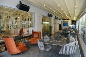 a restaurant with tables and chairs in a room at A11 HOTEL Exclusive in Istanbul