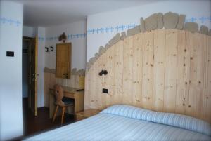 Postel nebo postele na pokoji v ubytování Maso La Vecchia Quercia