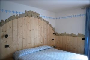 Postel nebo postele na pokoji v ubytování Maso La Vecchia Quercia