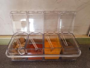 a plastic container filled with different types of food at Hurghada Village sea view in Hurghada