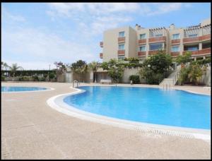 Bazén v ubytovaní Médano Tejita sunny garden +bbq+parking+pool alebo v jeho blízkosti