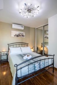 Llit o llits en una habitació de ToMaDi Residence