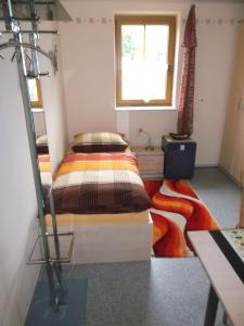 Postel nebo postele na pokoji v ubytování Pension/FeWo E. Tschernach
