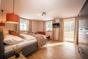 Postel nebo postele na pokoji v ubytování Apartment Schichlreit