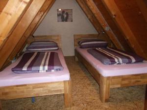 Postel nebo postele na pokoji v ubytování Pension/FeWo E. Tschernach