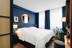 Letto o letti in una camera di Hotel Gilbert