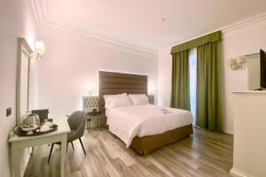 Postel nebo postele na pokoji v ubytování BB Hotels Smarthotel Bailey's