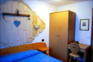 Postel nebo postele na pokoji v ubytování Maso La Vecchia Quercia
