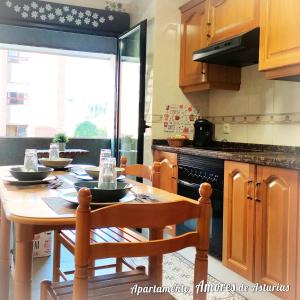 A kitchen or kitchenette at AMORES DE ASTURIAS