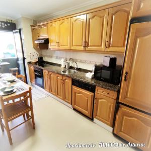 A kitchen or kitchenette at AMORES DE ASTURIAS