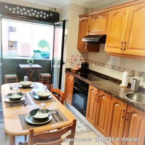 A kitchen or kitchenette at AMORES DE ASTURIAS