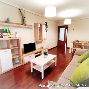 A television and/or entertainment centre at AMORES DE ASTURIAS