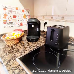 A kitchen or kitchenette at AMORES DE ASTURIAS