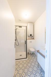 Koupelna v ubytování L'elegant - Appart'Hotel Le Gatsby