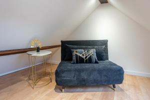 Posezení v ubytování L'elegant - Appart'Hotel Le Gatsby
