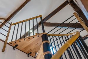 Palanda nebo palandy na pokoji v ubytování L'elegant - Appart'Hotel Le Gatsby