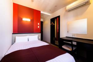 Voodi või voodid majutusasutuse Hotel Fosse Himeji toas