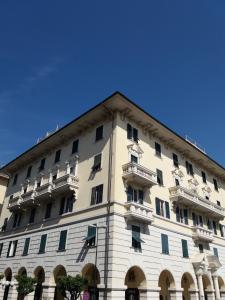 a large white building with balconies on the side of it at Residenza dell'Orto in Chiavari