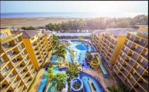 an aerial view of a resort with a water park at Aurora @ Morib Gold Coast in Banting