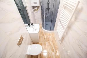 Kúpeľňa v ubytovaní Apartament City Center Standard 6 + 28 fotografií