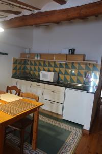 Kuchyň nebo kuchyňský kout v ubytování Casa Barría