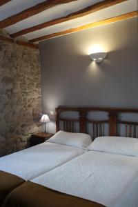 Postel nebo postele na pokoji v ubytování Casa Barría