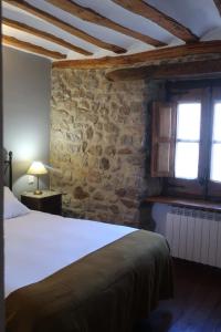 Postel nebo postele na pokoji v ubytování Casa Barría