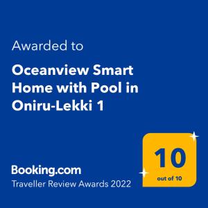 ein gelbes Schild mit der Nummer drauf. in der Unterkunft Oceanview Smart Home with Pool in Oniru-Lekki 1 in Lekki