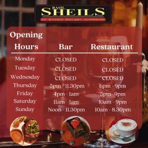 a sign for a restaurant with a list of dishes at Basil Sheils B&B Accommodation Armagh in Armagh