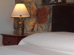 Ένα ή περισσότερα κρεβάτια σε δωμάτιο στο Νηρηίδες