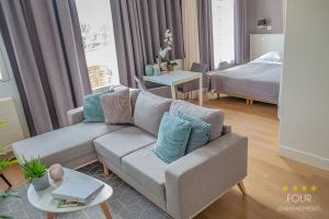 En eller flere senge i et værelse på Four Star Apartments - Berkenbosch Blokstraat