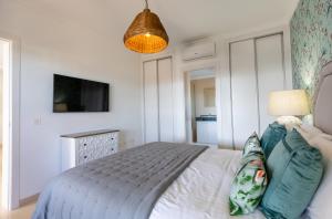Łóżko lub łóżka w pokoju w obiekcie Villa Penguina Play Blanca Lanzarote