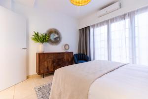 Łóżko lub łóżka w pokoju w obiekcie Villa Penguina Play Blanca Lanzarote
