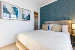 Łóżko lub łóżka w pokoju w obiekcie Villa Penguina Play Blanca Lanzarote