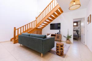 Telewizja i/lub zestaw kina domowego w obiekcie Villa Penguina Play Blanca Lanzarote