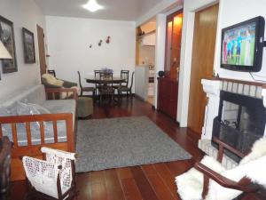 Posezení v ubytování Apartamento Centro Gramado