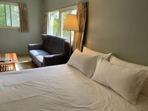 Letto o letti in una camera di 菜爺爺親子蔬宿Vegepapa B&B
