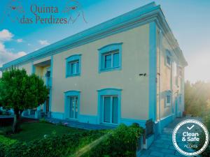 a rendering of a house with a sign in front of it at Quinta das Perdizes in Ponta Delgada