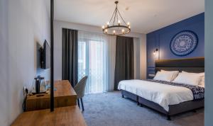 Кровать или кровати в номере Matiane Boutique Hotel