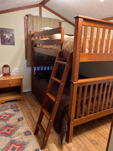 
A bunk bed or bunk beds in a room at The Lodge at Devils Tower
