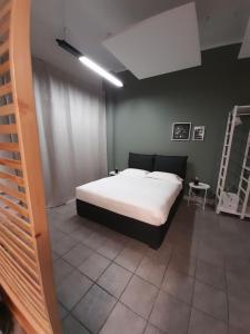 Ліжко або ліжка в номері Loft in corte