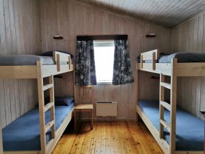 Postel nebo postele na pokoji v ubytování Tron Ungdomssenter