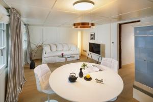 Postel nebo postele na pokoji v ubytování La Colombe Boutique Hotel