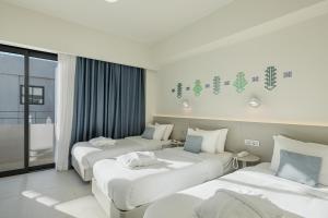 Voodi või voodid majutusasutuse Arkadi Hotel toas